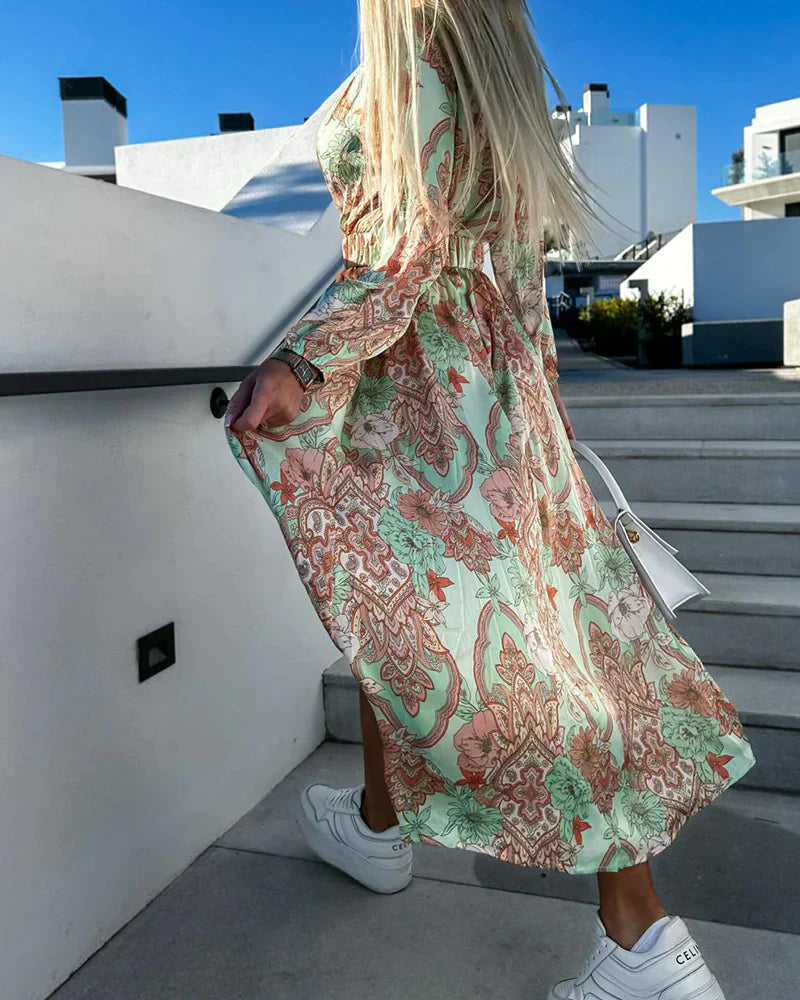 Printed dress with slit and V-neck
