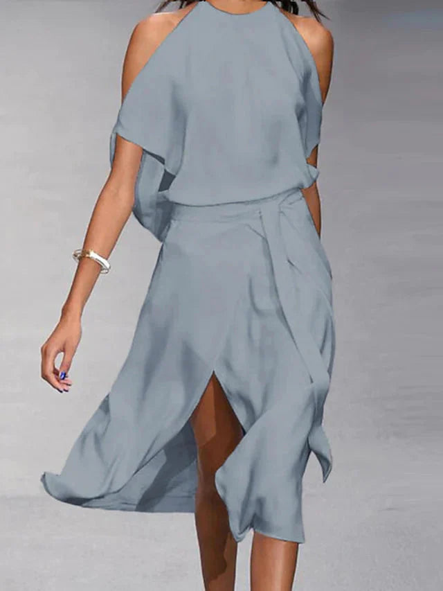 Madonna | Elegant dress with trendy shoulder cutouts.