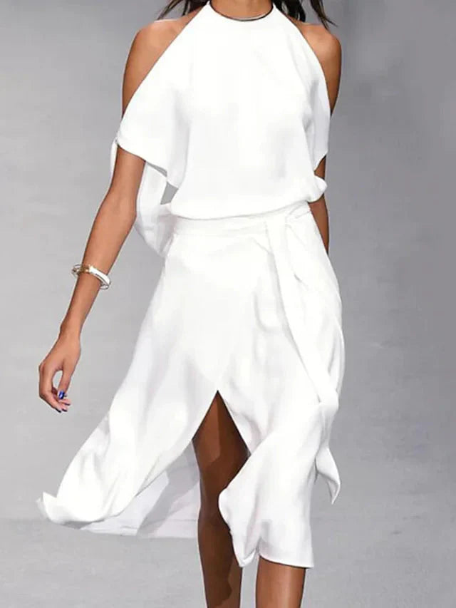 Madonna | Elegant dress with trendy shoulder cutouts.
