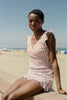 Swimsuit with integrated bra and removable cups