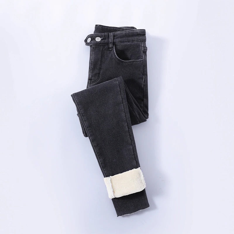 Fleece-lined women's winter jeans with high waist