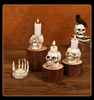 GothicGlow™ 3pc Halloween Skull Candle Holder Set